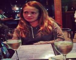 Britt Robertson consuming alcohol
